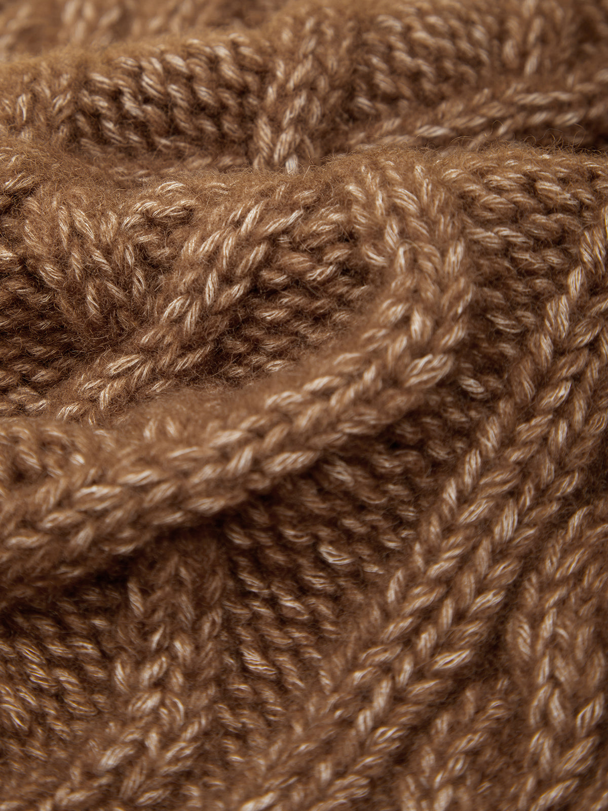 Close-up of brown yarn with a textured pattern
