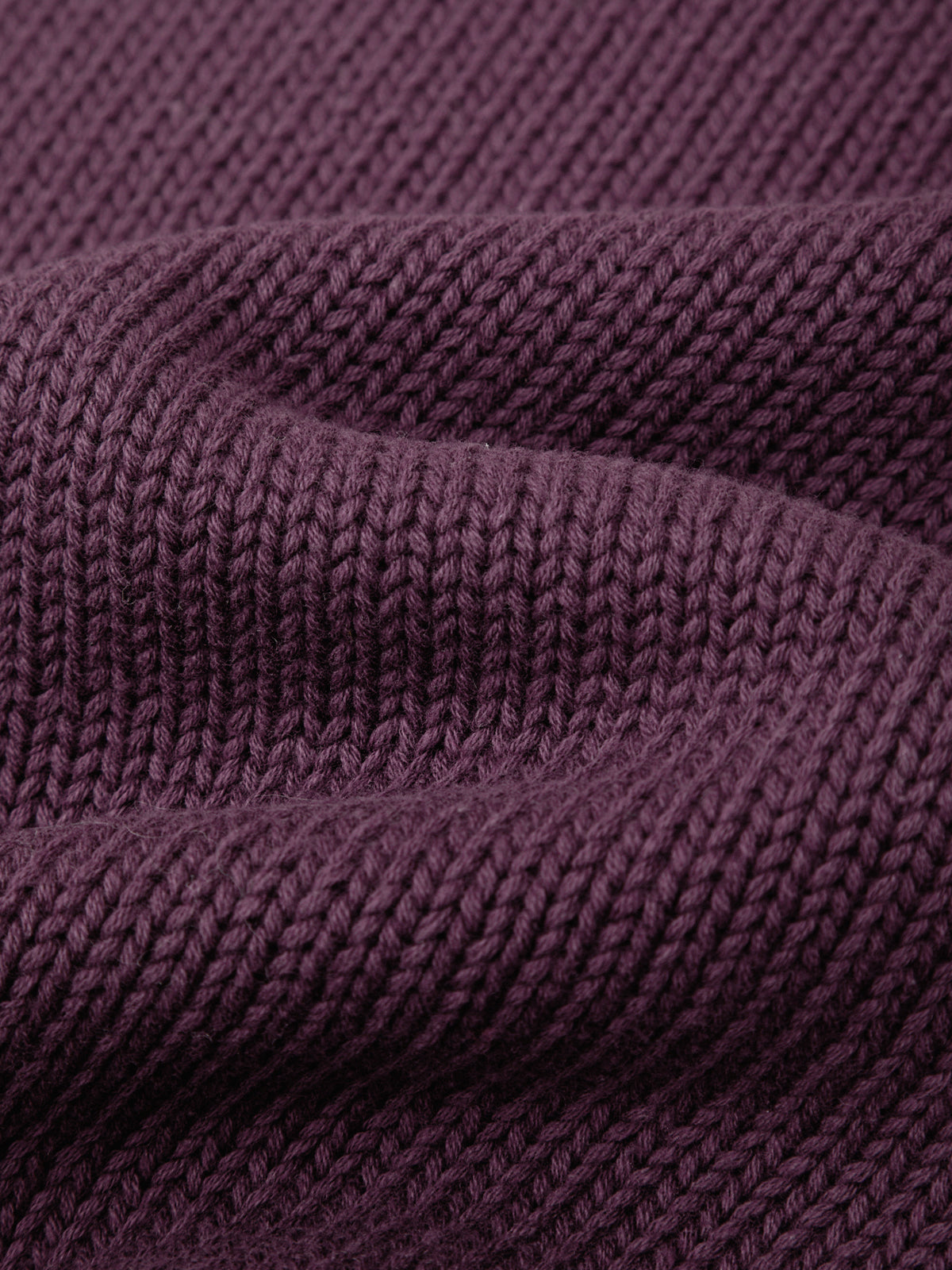 Close-up of purple knitted fabric