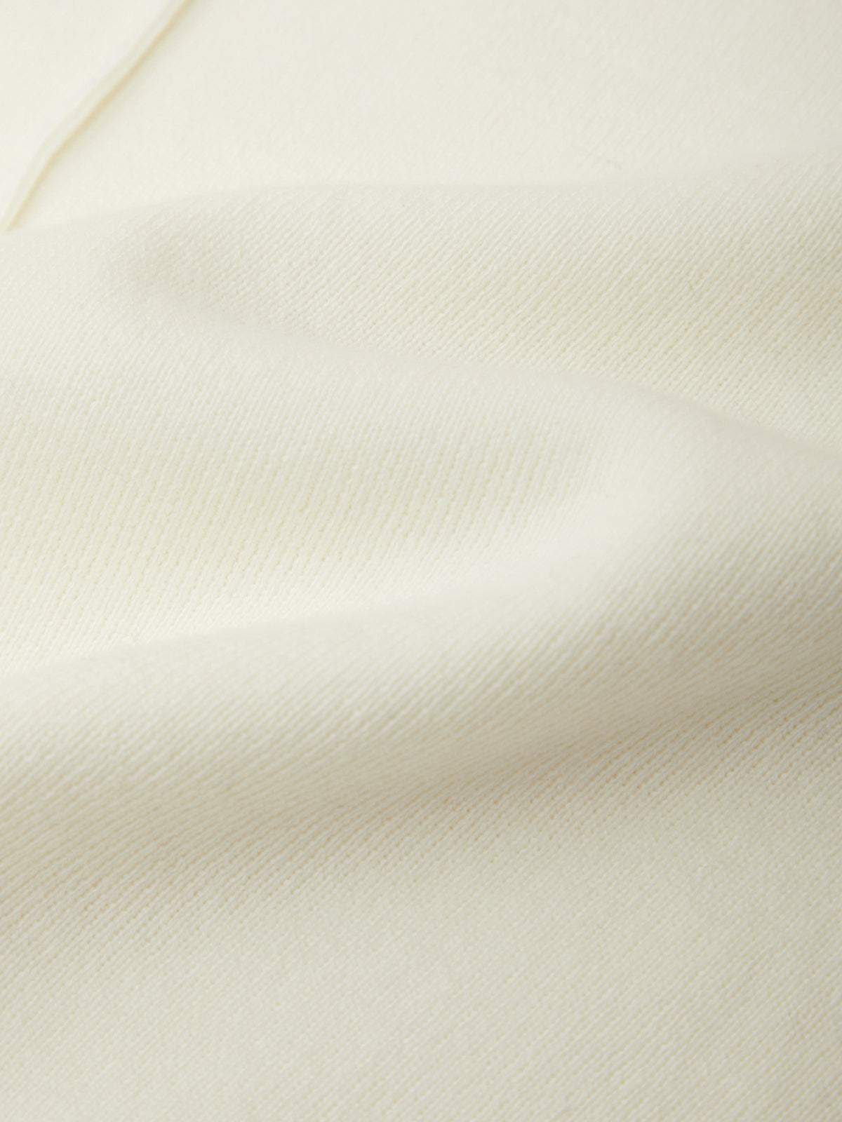 Close-up of beige fabric texture