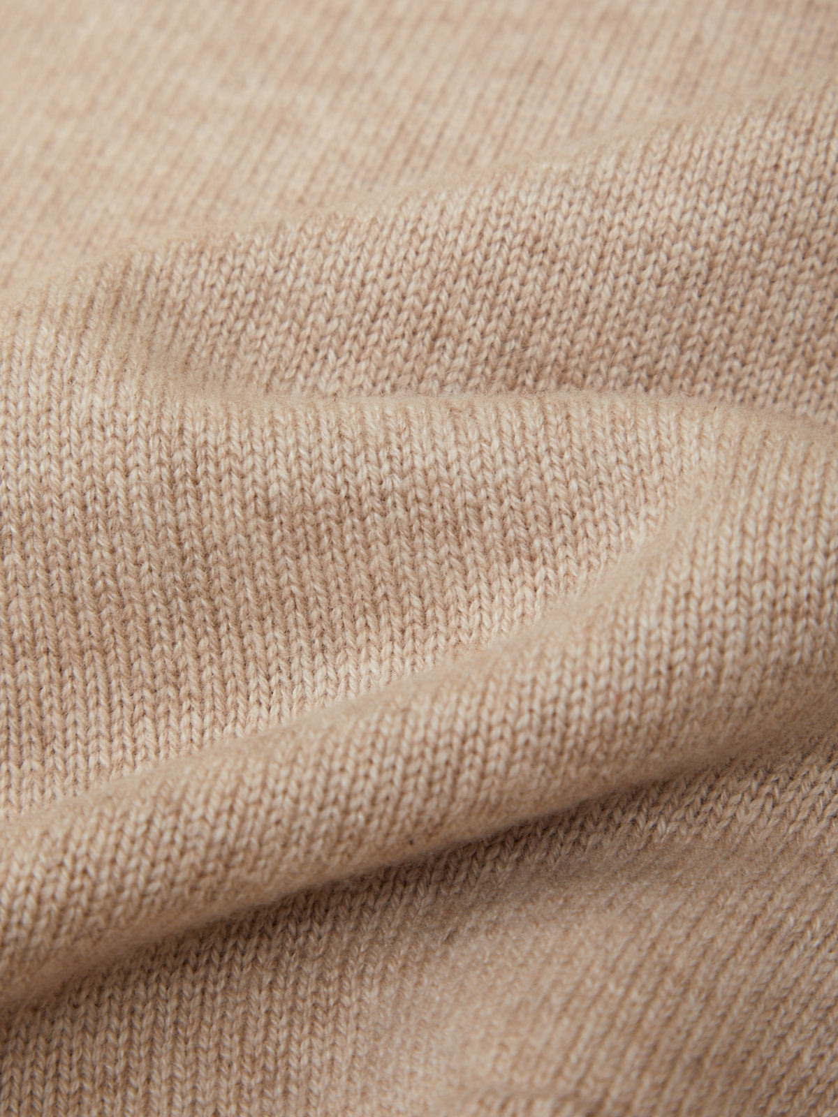 Close-up of beige fabric texture