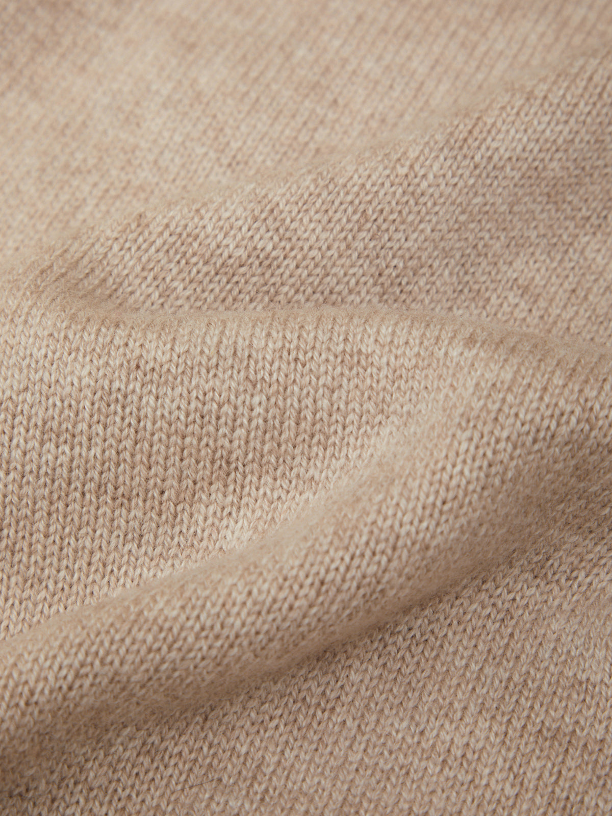 Close-up of beige fabric texture