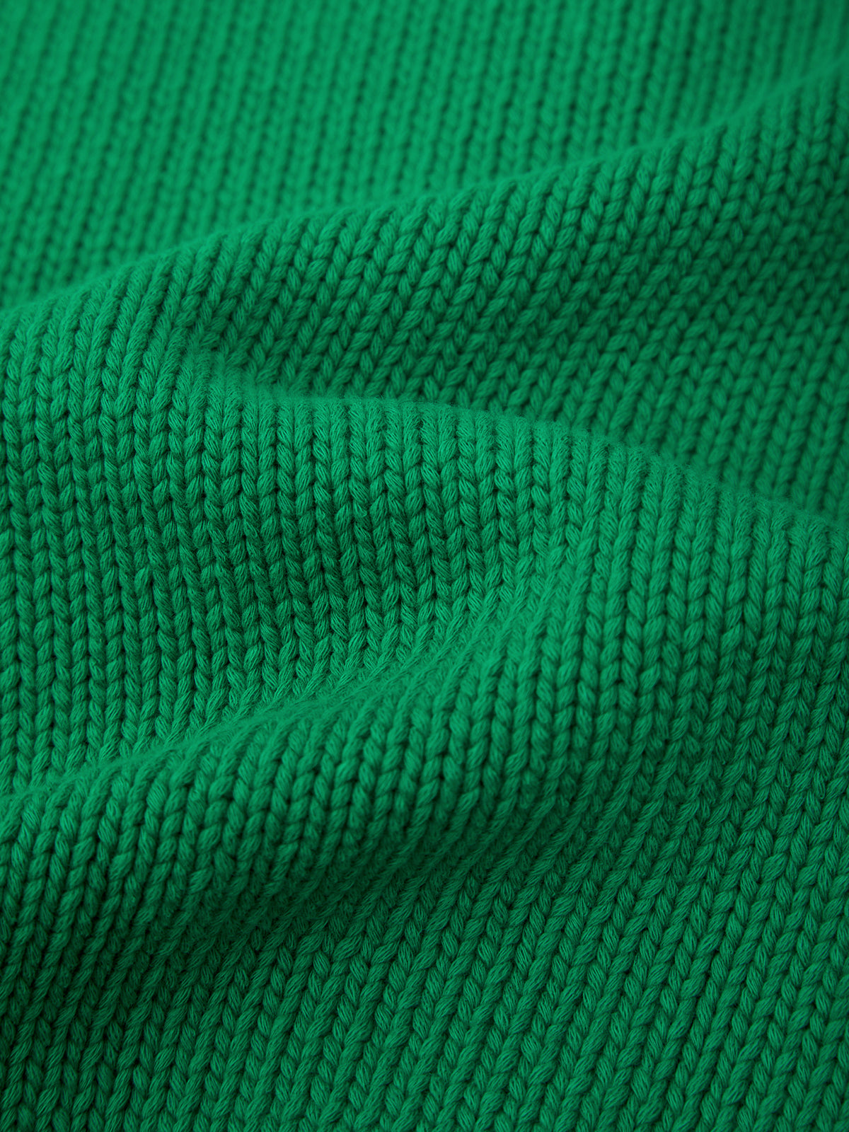 Close-up of green knitted fabric