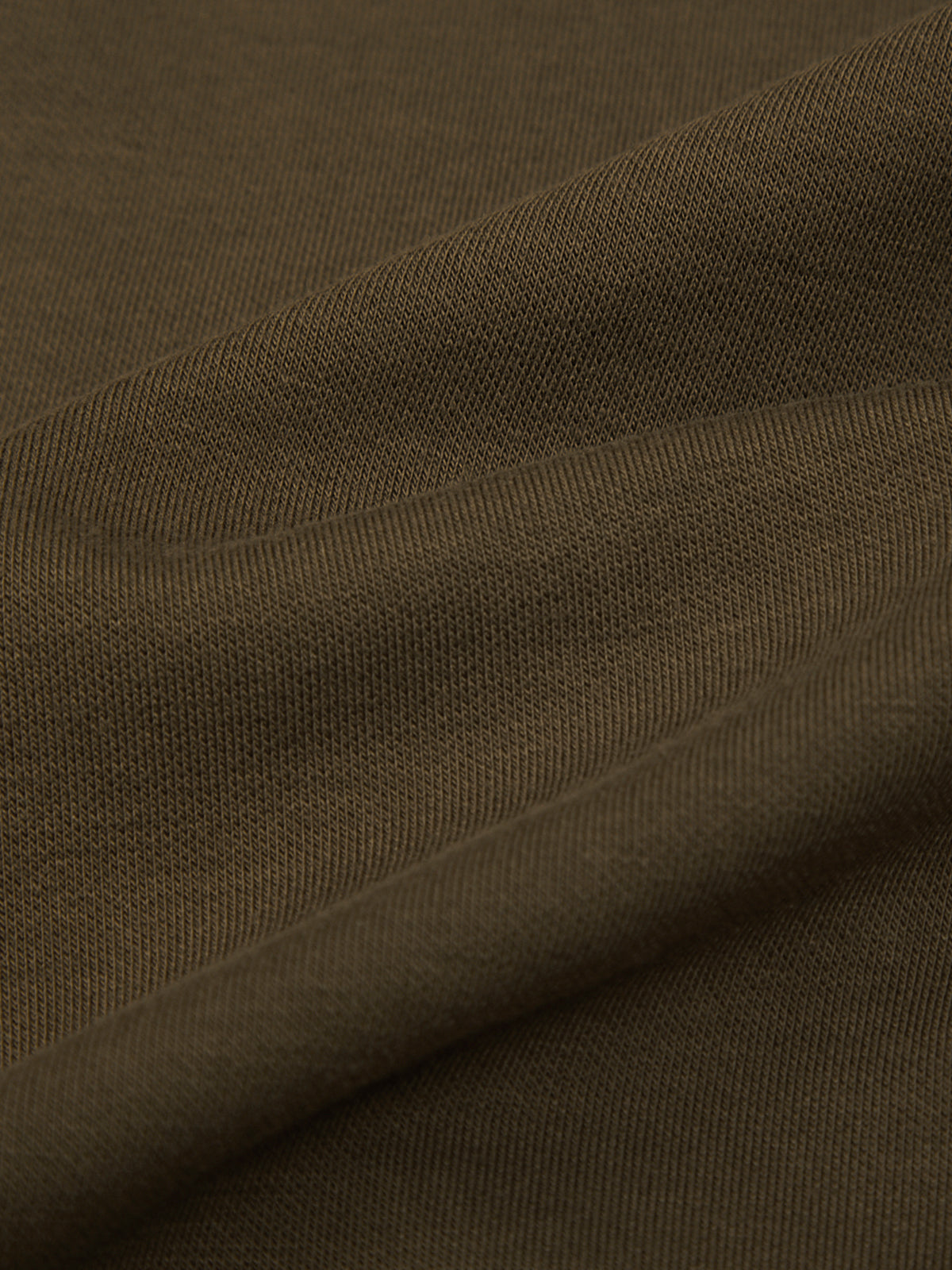 Close-up of brown fabric with visible texture