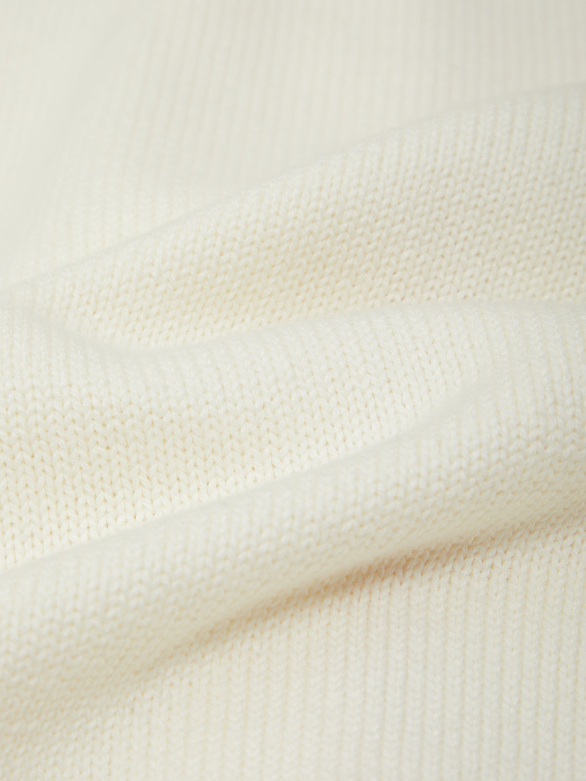Close-up of beige fabric texture