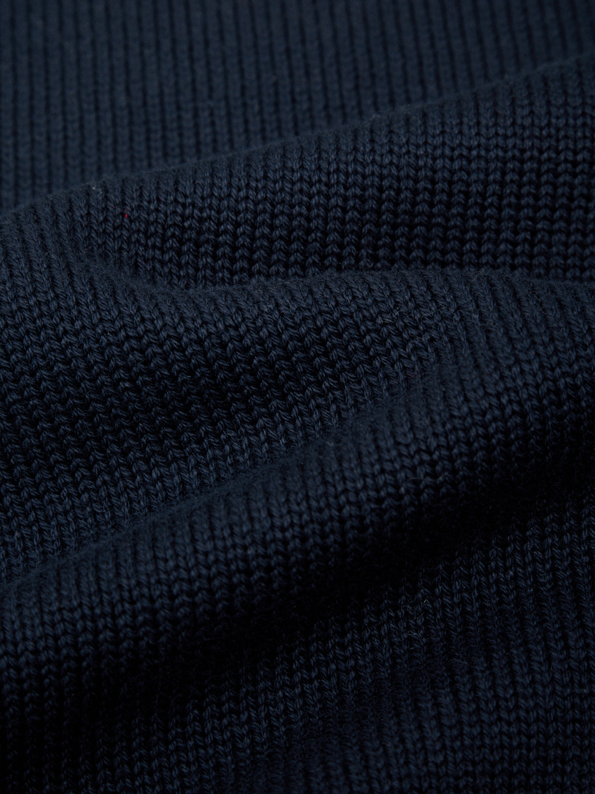 Close-up of dark blue fabric texture