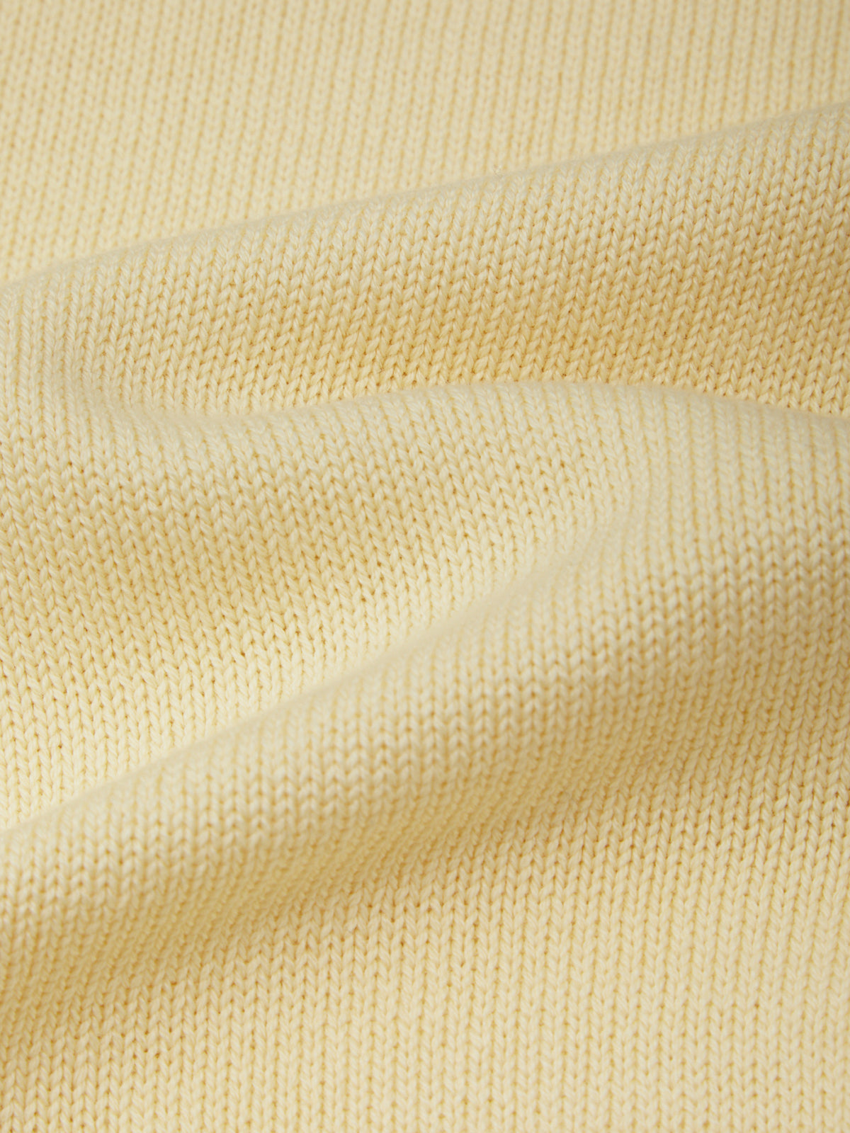 Close-up of beige fabric texture