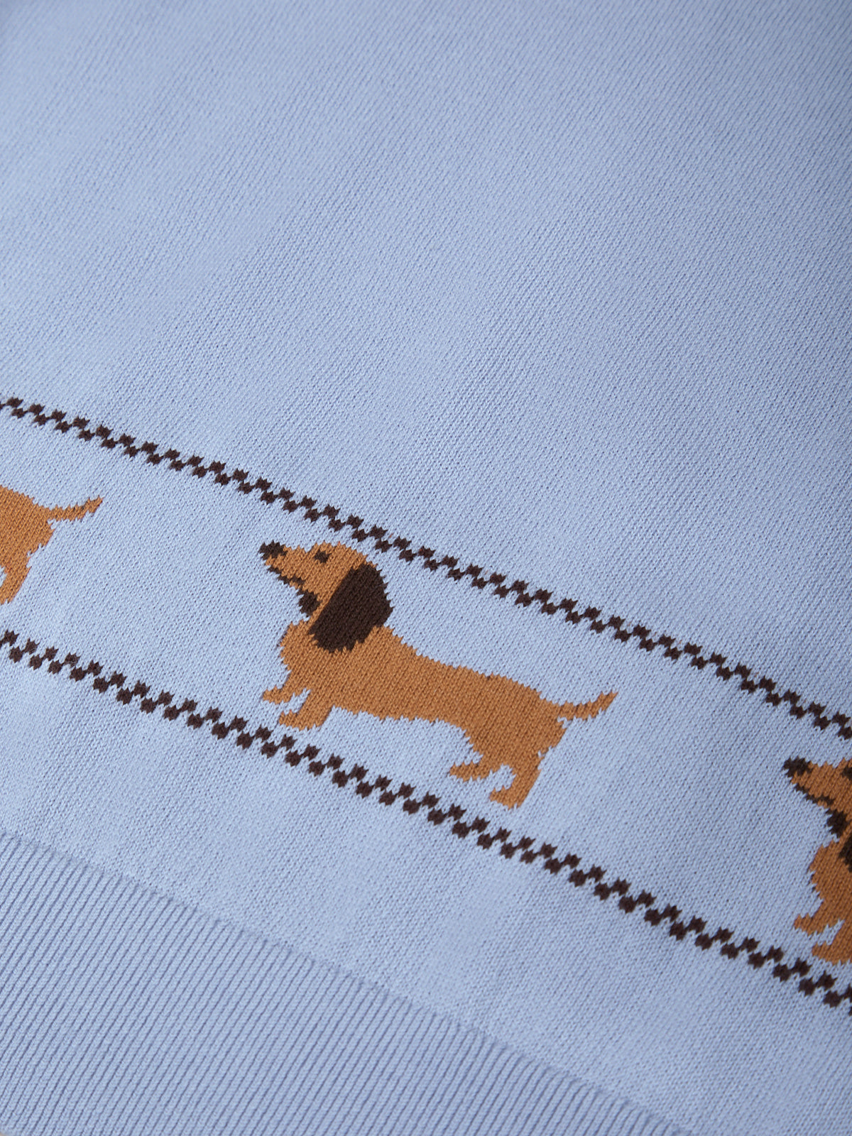 Light blue fabric with brown dachshund pattern