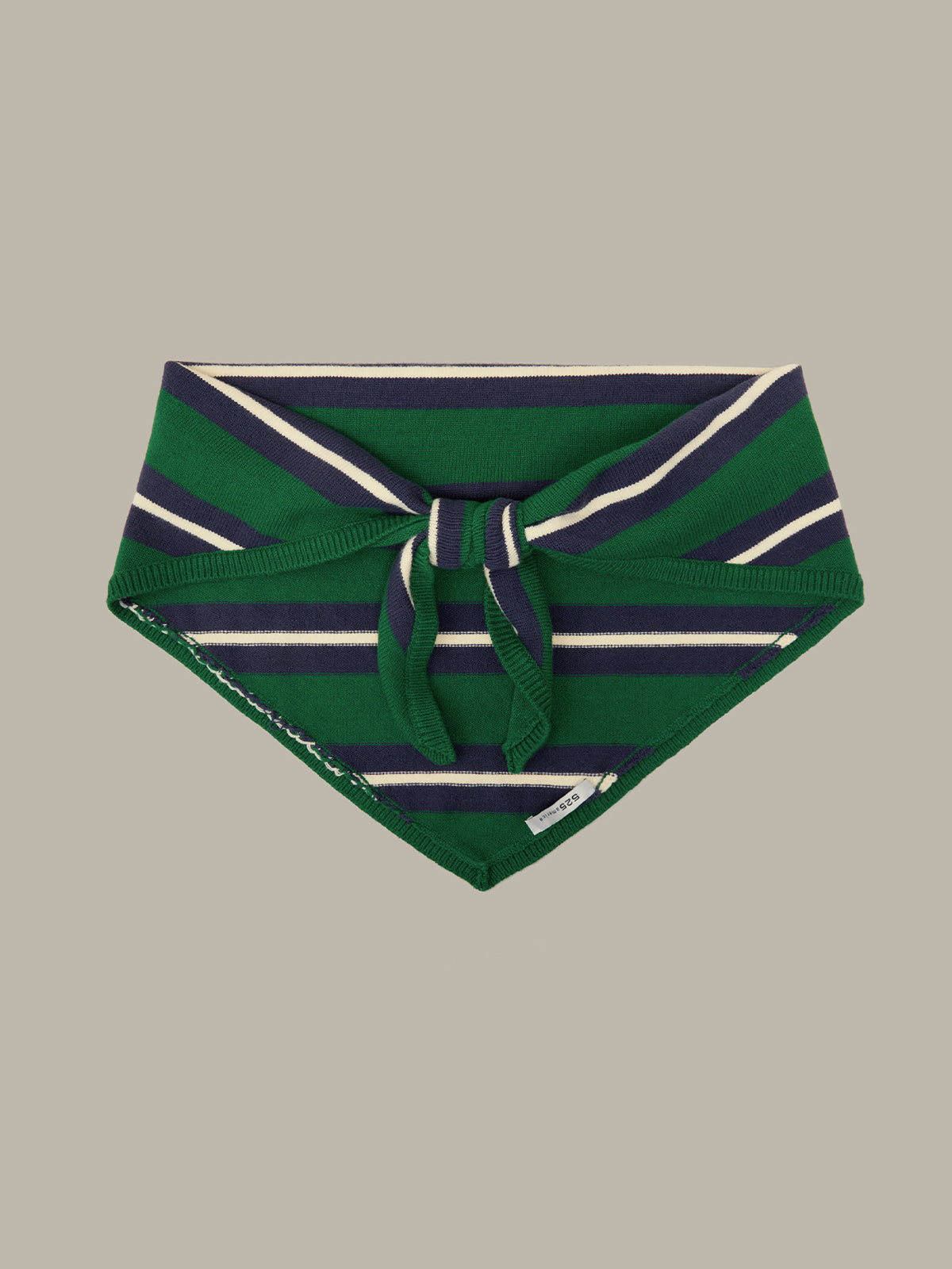 A green knit pet bandana with navy and white horizontal stripes, featuring a knotted front tie, shown flat against a solid taupe background.